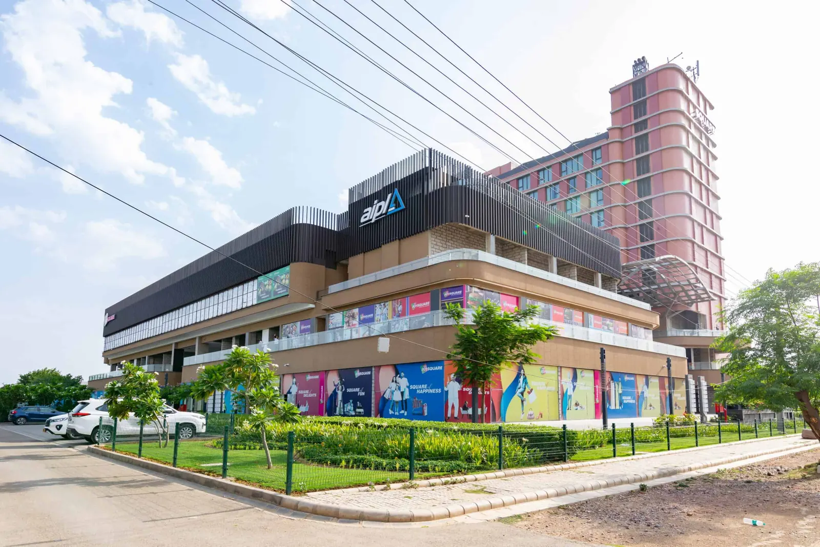 AIPL Joy Square built retail podium and residence tower at the Sector 63A corner, actual photograph