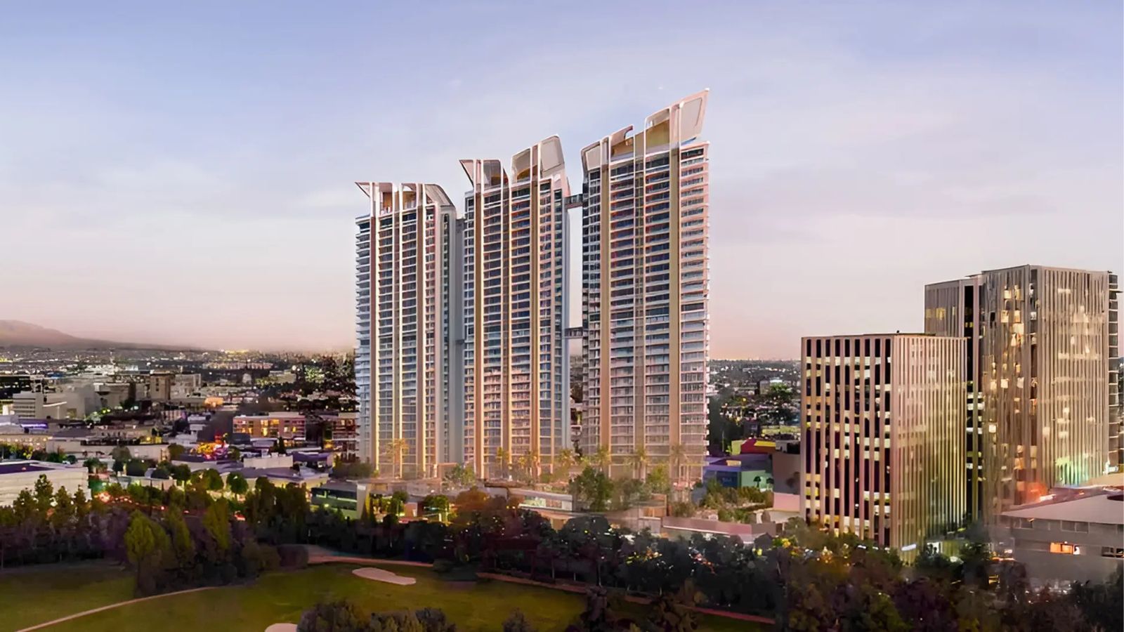 M3M Altitude three towers rising over the golf greens at dusk, artist's impression