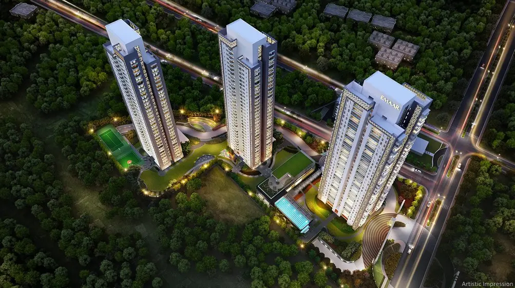 Emaar Digihomes three towers and landscaped base, aerial view at night