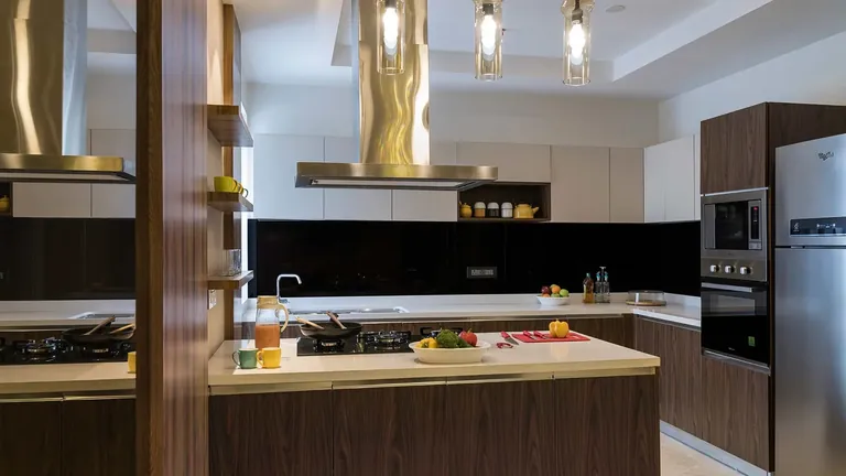 Adani M2K Oyster Grande apartment modular kitchen with chimney and hob, photo
