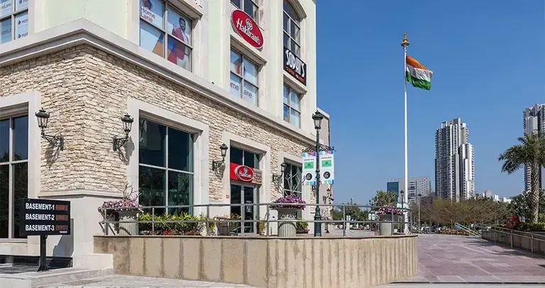 AIPL Joy Street Chaayos store at the street-facing entrance