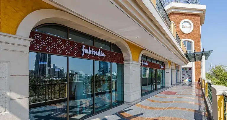 AIPL Joy Street Fabindia storefront on the street side