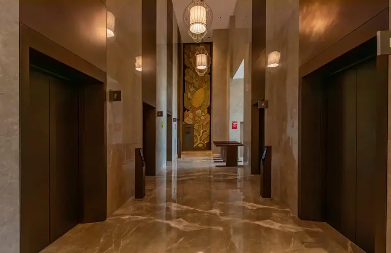 AIPL Signature lift lobby in stone