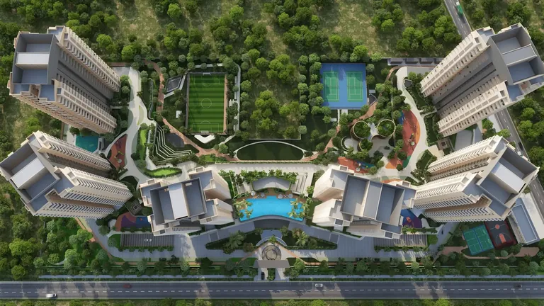 Ashiana Aaroham aerial view of the towers ringed around the central greens, football field and pool, artist's impression