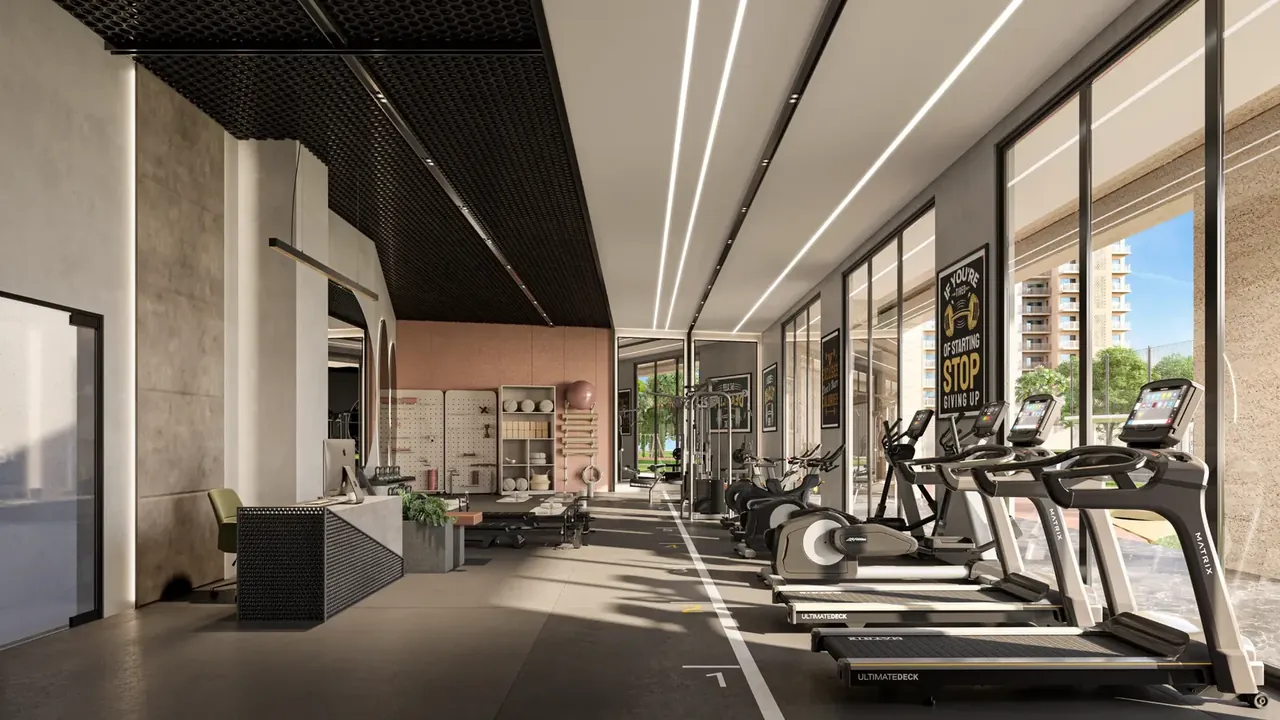 Ashiana Aaroham indoor gym with treadmills along a glass wall, artist's impression