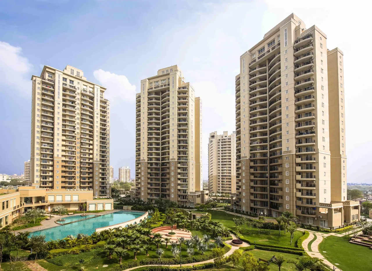 ATS Kocoon swimming pool deck and gardens framed by the residential towers, photo