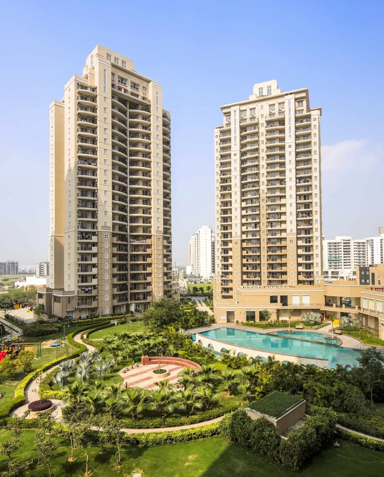 ATS Kocoon two towers above the pool and flower gardens, photo
