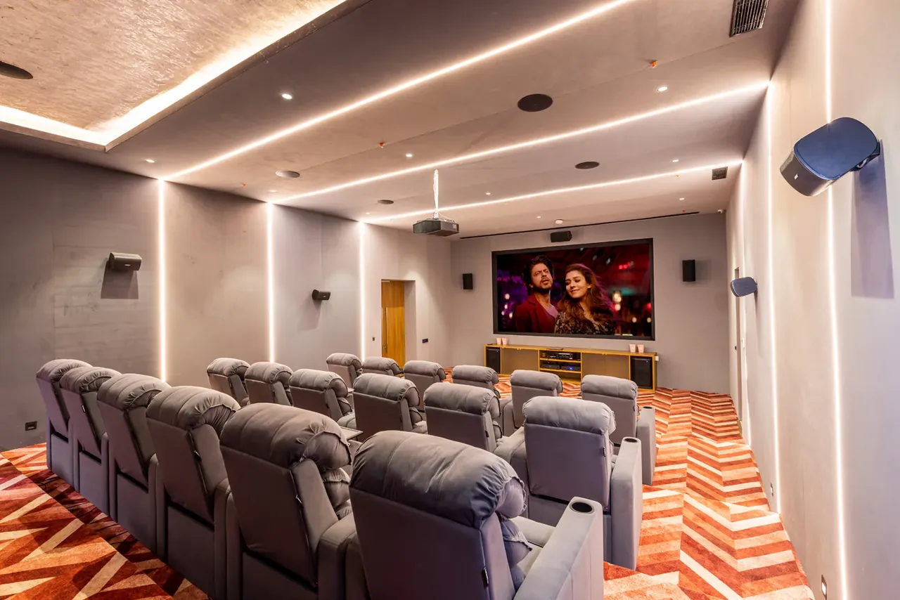 BPTP Amstoria clubhouse preview theatre with recliner seats, photo