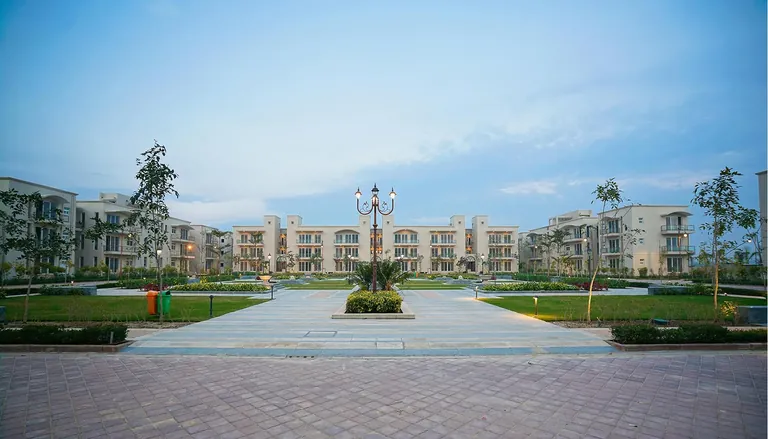 BPTP Amstoria completed low-rise floors around a paved central plaza, photo