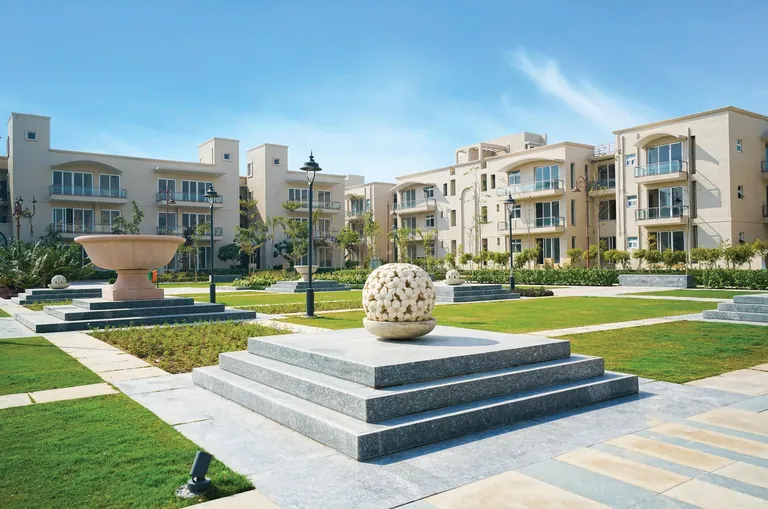 BPTP Amstoria independent floors facing a landscaped courtyard garden, photo