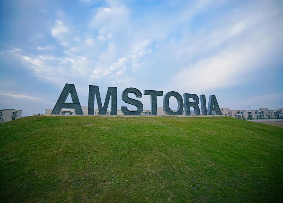 BPTP Amstoria landmark letter sign on the entrance green mound, photo