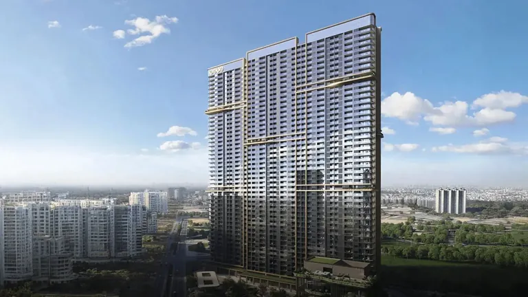 BPTP Gaia Residences at Amstoria high-rise tower with gold accents, artist's impression