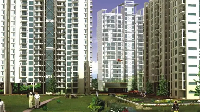 BPTP Mansions Park Prime residential towers around a landscaped lawn and water channel, artist's impression