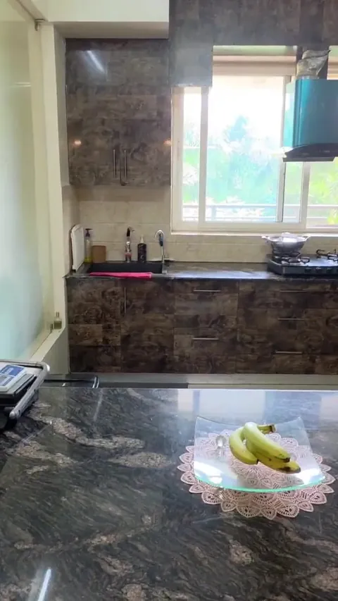 Brisk Lumbini Terrace Homes 3 BHK modular kitchen with a granite counter, actual photograph