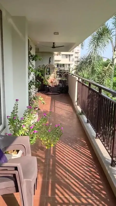 Brisk Lumbini Terrace Homes long verandah of a 3 BHK with planters over the greens, actual photograph