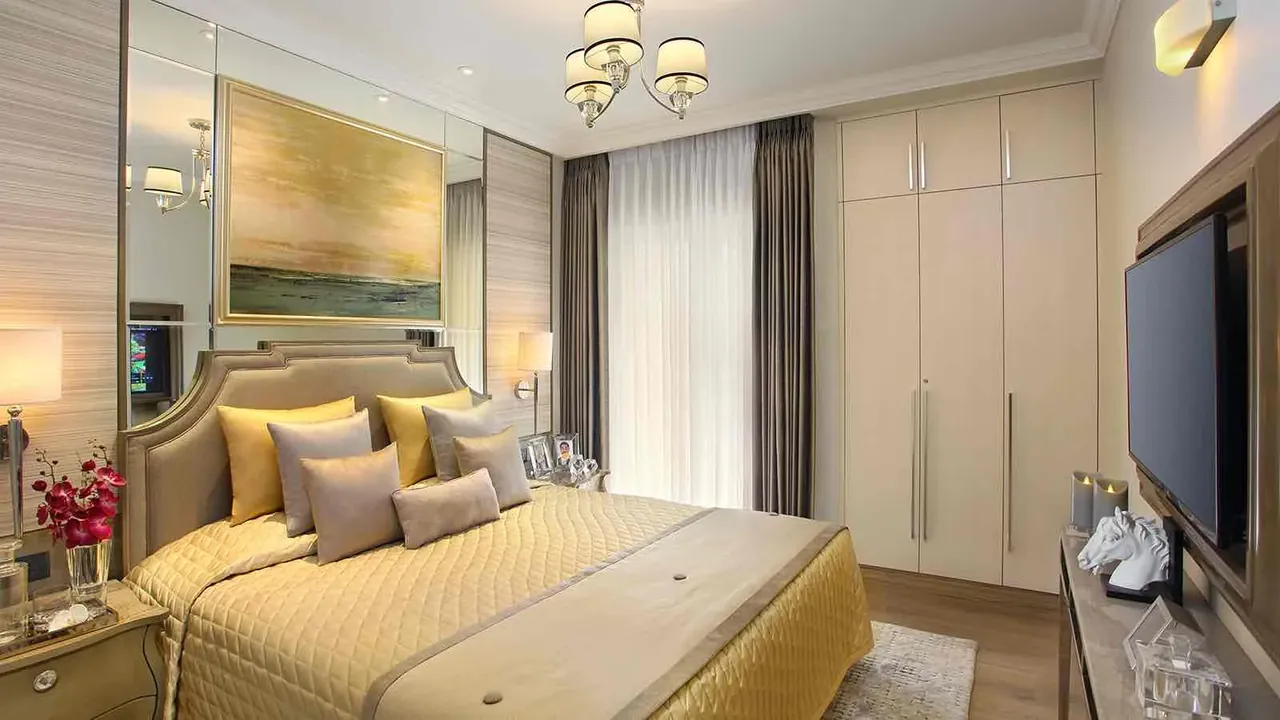 Central Park Cerise Floors master bedroom with a wardrobe wall