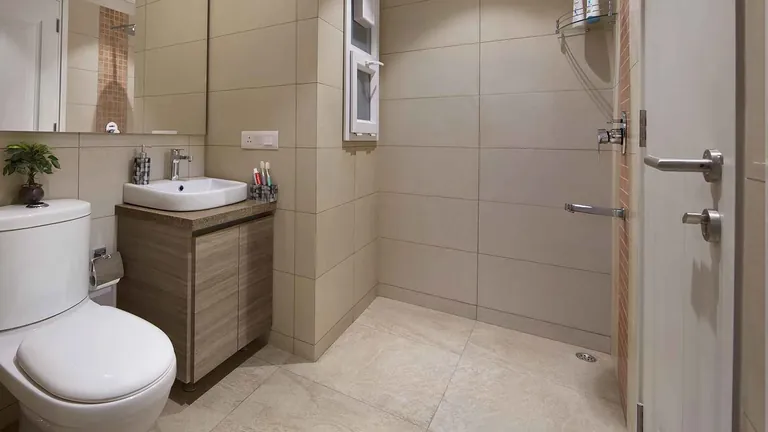 Central Park Flamingo Floors bathroom with a glass shower