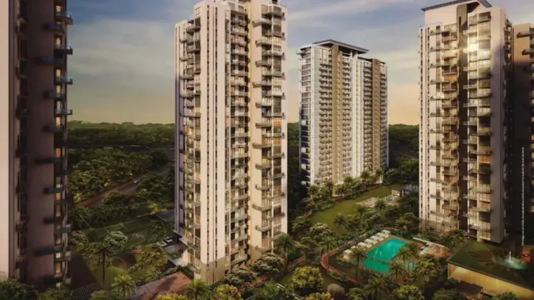 Conscient Heritage Max residential towers above landscaped greens at sunset, artist's impression