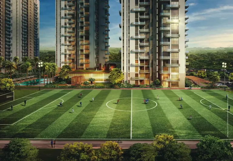 Conscient Heritage Max football ground in front of the towers at dusk, artist's impression