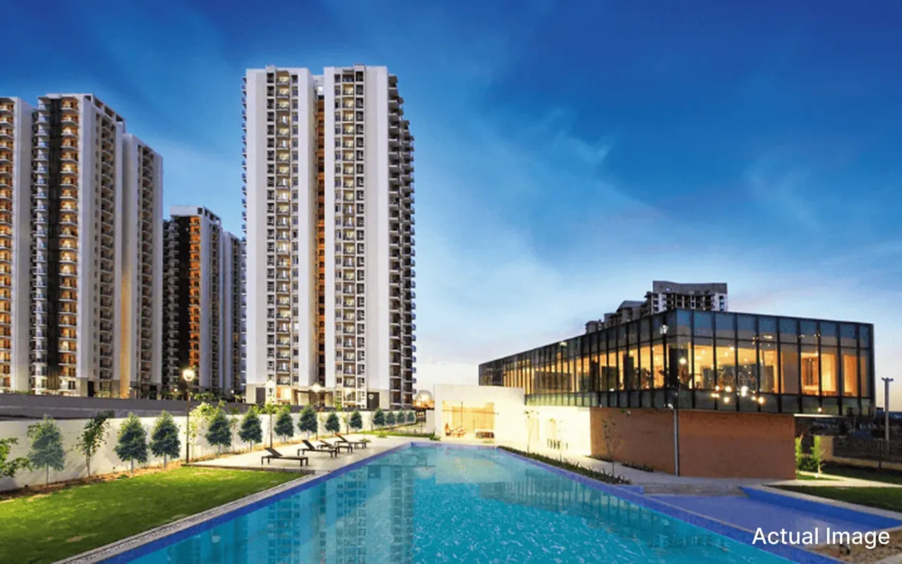 Conscient Heritage One pool and clubhouse with the towers behind