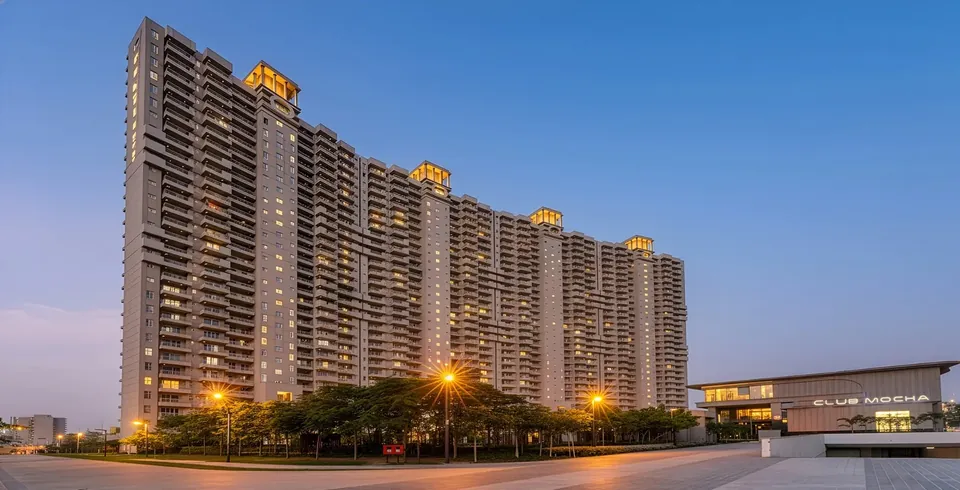 County The Center Court completed towers and Club Mocha clubhouse at dusk, Sector 88A