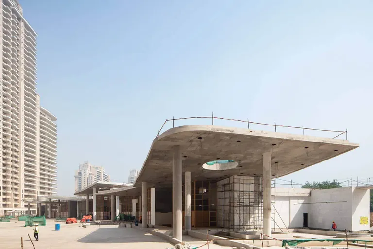 DLF The Camellias club pavilion with the residential towers behind