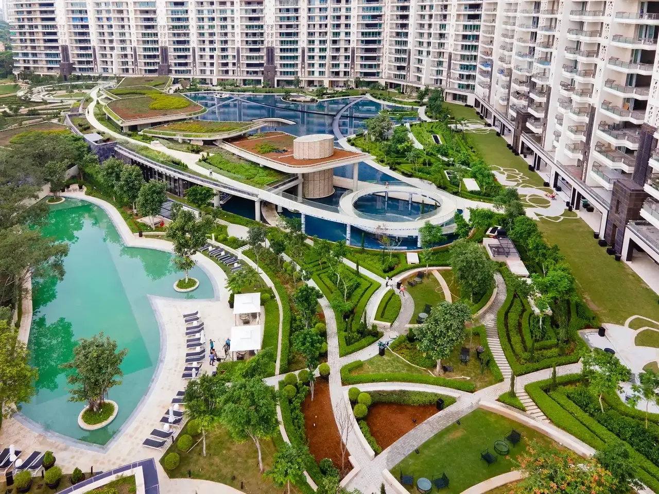 DLF The Camellias podium gardens, lagoon pool and lawns between the towers, seen from above