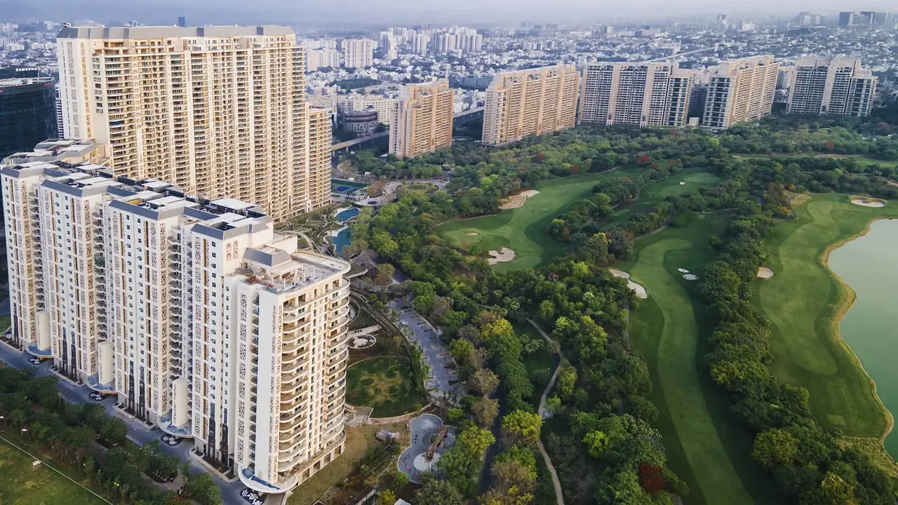 DLF The Camellias towers seen from the air over the DLF Golf and Country Club fairways and lake