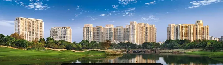 DLF The Crest towers across the golf course lake