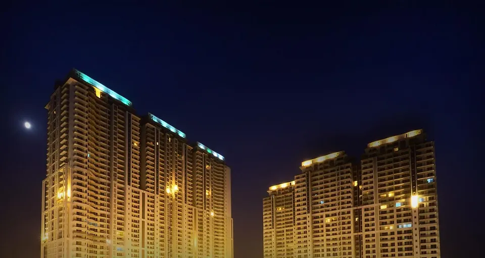 DLF The Crest towers seen from below at night