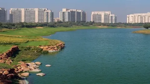 DLF The Magnolias and DLF5 Golf Links across the golf course