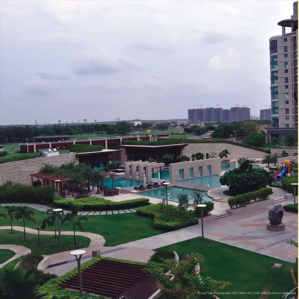 DLF The Magnolias pool deck and gardens between the towers