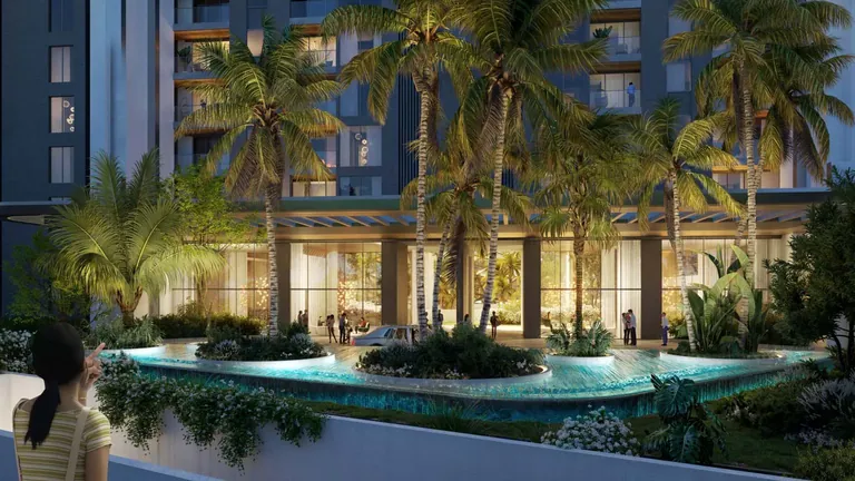 Elan The Presidential tower lobby and landscaped pool court at dusk, artist's impression