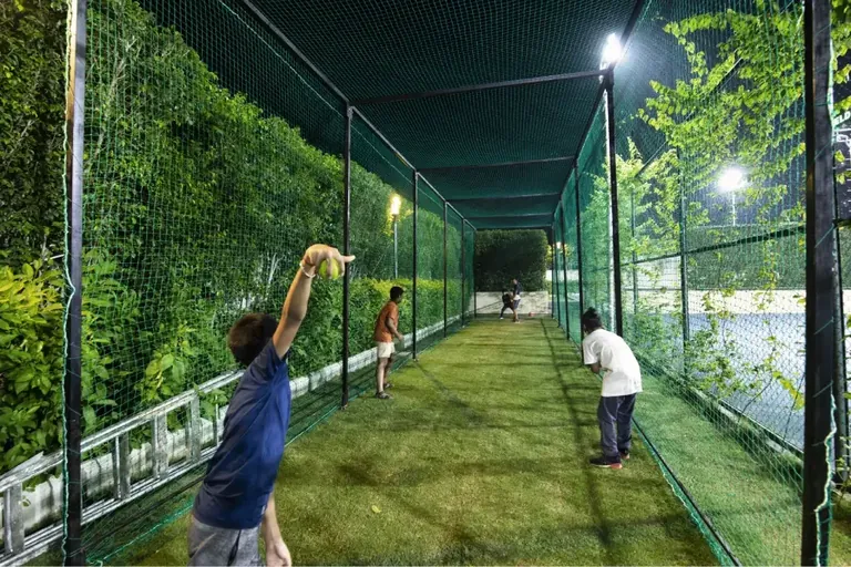 Eldeco Accolade cricket practice nets at night