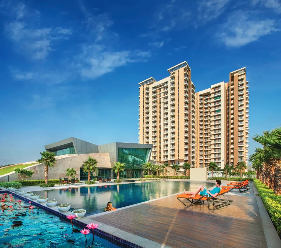 Eldeco Accolade Eldeco Accolade tower beside the pool deck