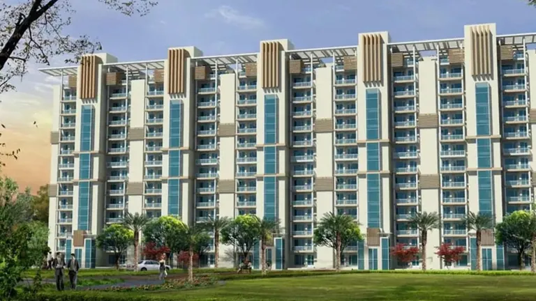 Emaar Gurgaon Greens G+13 apartment towers with twin elevator cores, front elevation, artist's impression