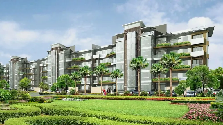 Emaar Gurgaon Greens low-rise apartment blocks facing the landscaped central greens, artist's impression