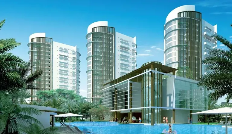 Emaar MGF The Palm Drive Sky Terraces towers behind the glass clubhouse and pool, artist's impression