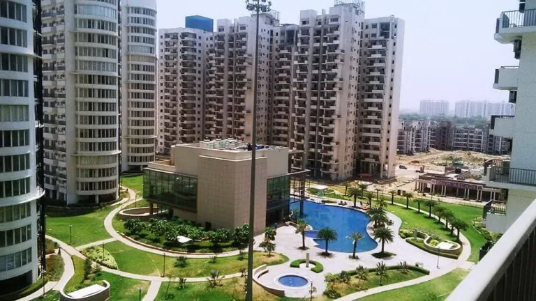 Emaar MGF The Palm Drive completed towers around the clubhouse, pool and landscaped lawns