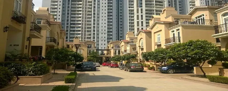 Emaar The Palm Springs villa lane with the apartment towers behind