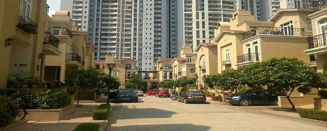 Emaar The Palm Springs villa lane with the apartment towers behind