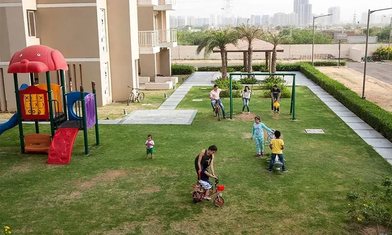 Experion The Heartsong children's play area on the central lawn, actual photo
