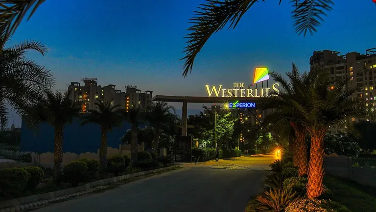 Experion The Westerlies entrance signage lit up at night, actual photo