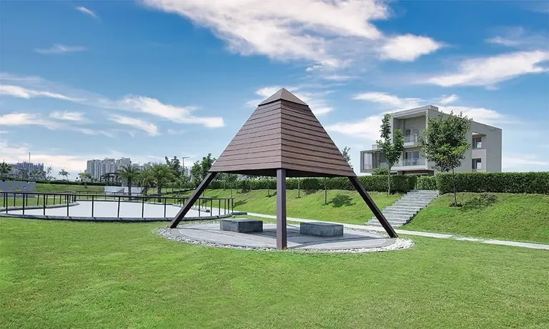 Experion The Westerlies pyramid gazebo on the landscaped lawn, actual photo