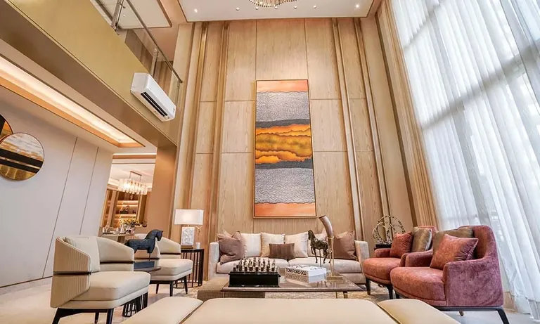 Experion Windchants duplex villament double-height living room, actual photo