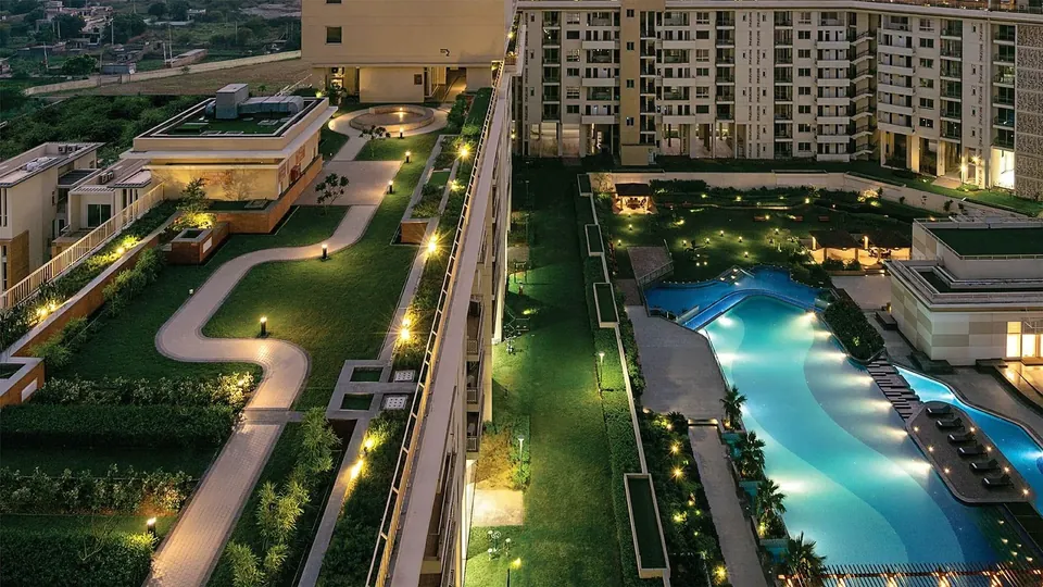 Experion Windchants skywalk garden and pool at night, actual photo