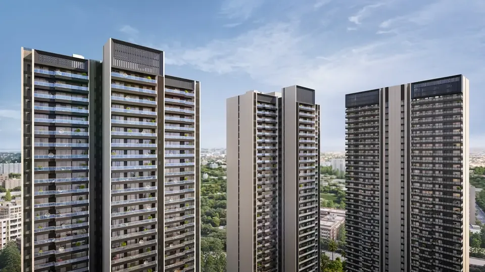 Godrej Miraya towers above the trees
