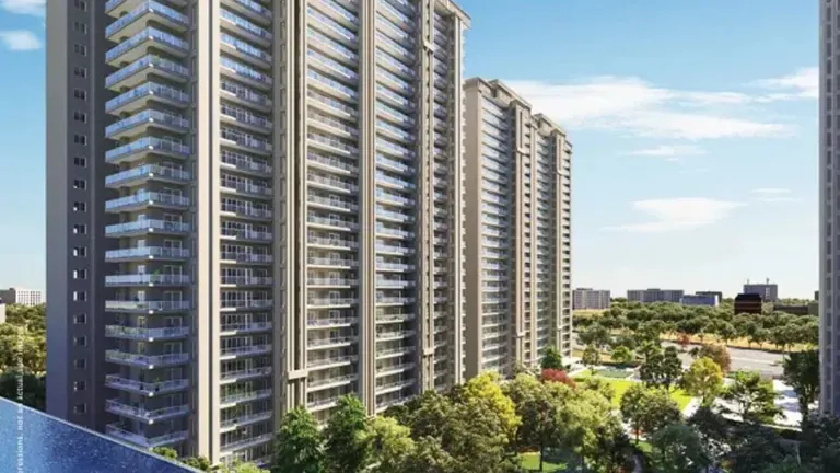 Godrej Vrikshya tower elevation with glass balconies above the lawn, artist's impression