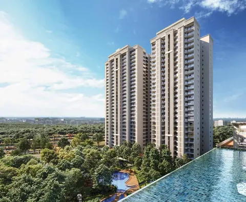Godrej Vrikshya twin towers rising above the infinity pool and treetops, artist's impression