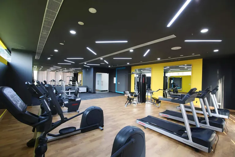 Indiabulls Enigma clubhouse gym with treadmills and cross trainers, photo
